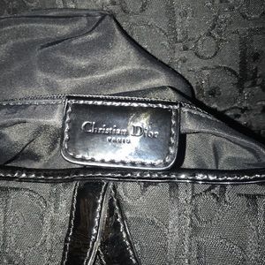 Purse. one side of the purse is missing the C.